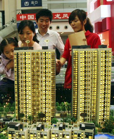 Experts: Housing prices to drop in Guangdong this year