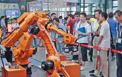 Rising wages should feed robot boom, say experts