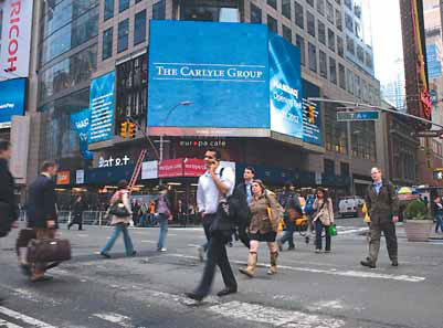 Carlyle buys stake in health checkup firm