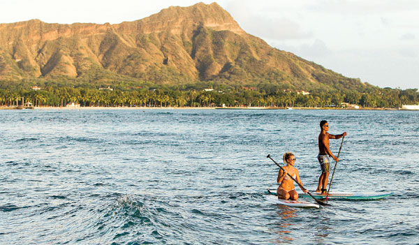 Soaking up Waikiki, surfing to sunsets, for a song