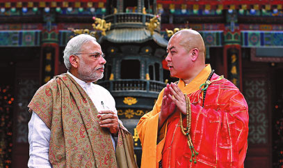 After warm greeting in Xi'an, Modi visits temple, warriors
