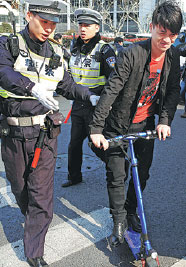 Scooters banned from roads in Beijing, Shanghai