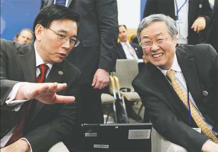 PBOC governor urges speed in approving changes to IMF