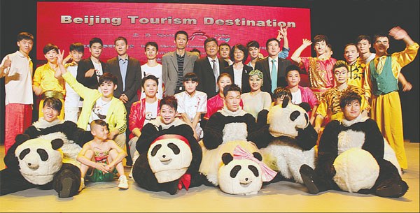 Pandas dance, spotlight Beijing