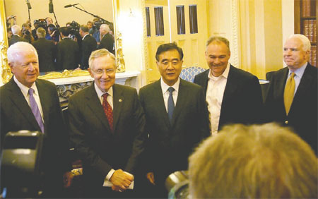 Wang, Yang make the rounds in DC