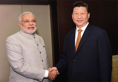 Xi meets with India's new PM