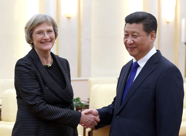 Xi sees Harvard head in Beijing