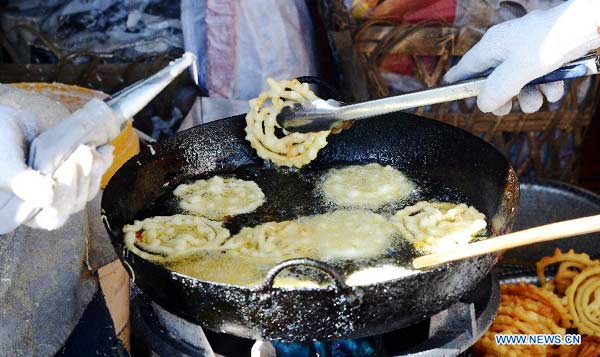 People make traditional food 