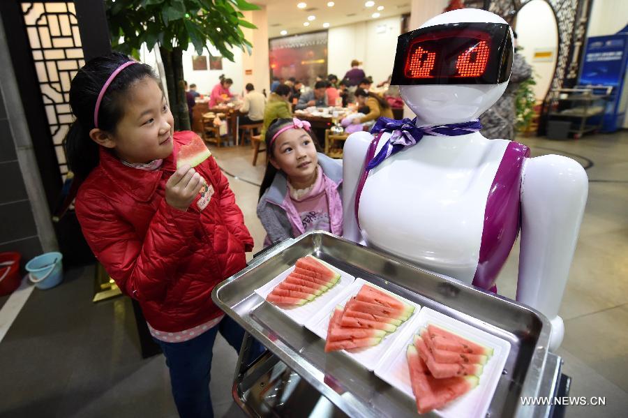 Robot waiter serves customers in Xuchang