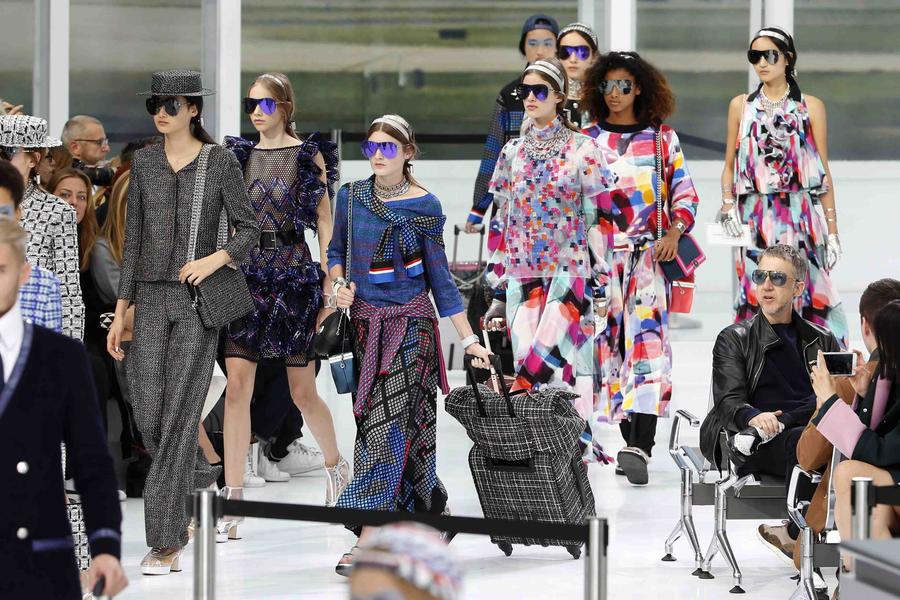 All aboard Chanel Airways as Lagerfeld's imagination takes flight