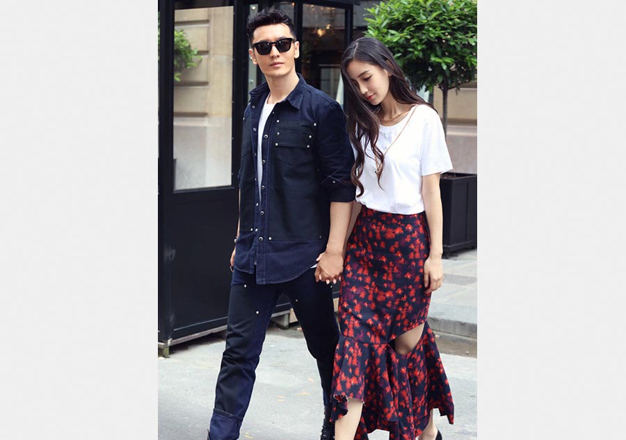 Huang Xiaoming and Angelababy spotted in Paris