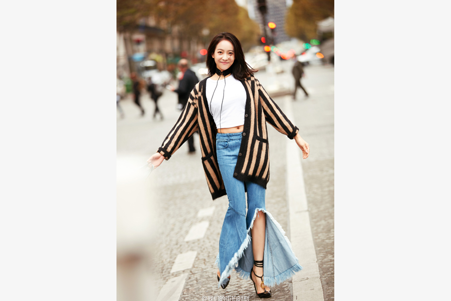 Song Qian poses for street style photos