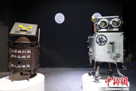 Jackie Chan exhibits artworks of movie props to promote recycling