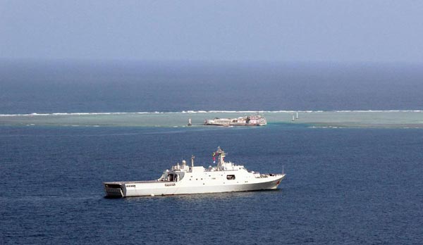 Who is militarising the South China Sea and the world?