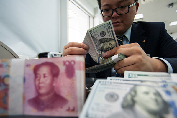 Economy still strong despite yuan's fall