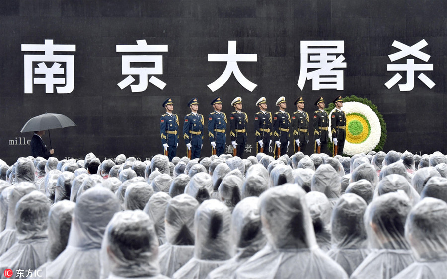Thousands pay tribute to victims of Nanjing Massacre