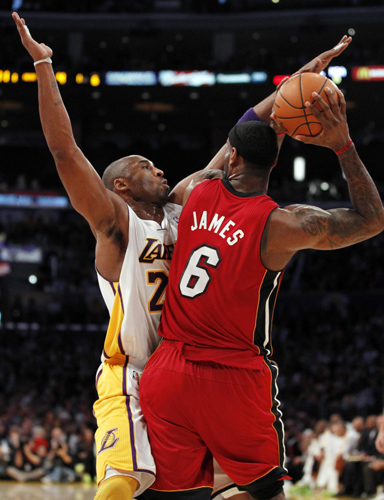 LeBron has a triple-double, Heat routs Lakers