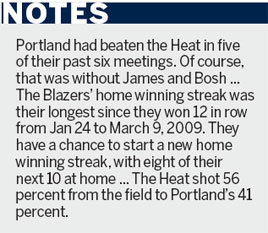 James scores 44, Heat top Blazers in OT
