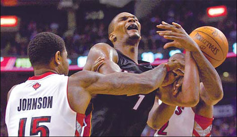 Heat beat Raptors in Bosh homecoming