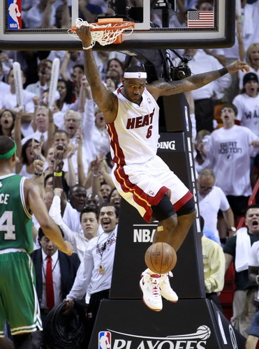 James delivers decisive blow as Heat finish Celtics