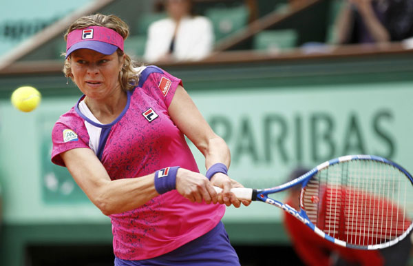Clijsters out of Wimbledon with foot injury
