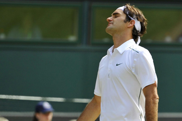 Federer cut down by inspired Tsonga despite 2-set lead