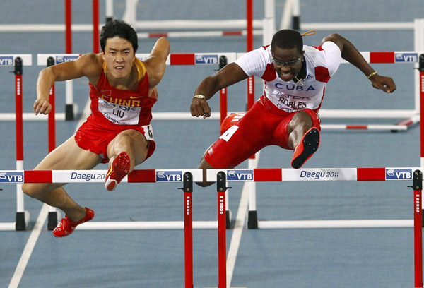 Robles wins 110 metres hurdles world title