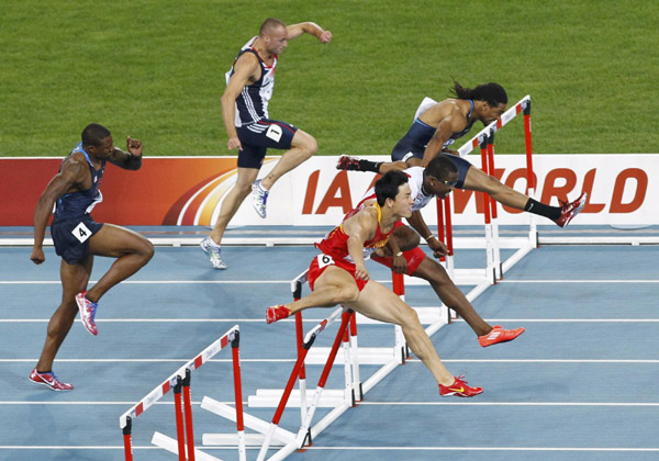 Robles wins 110 metres hurdles world title