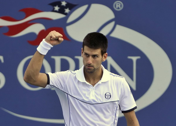 Djokovic wins marathon tiebreak to reach quarters