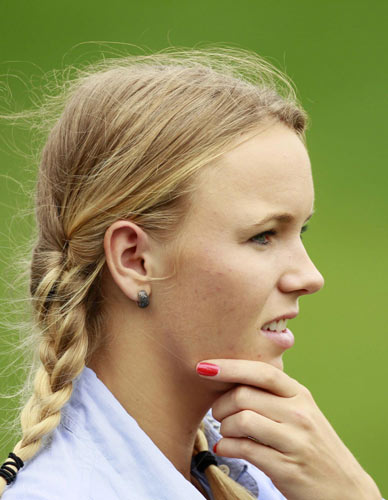 World No 1 Wozniacki roots for golfer boyfriend