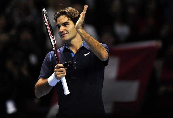 Federer warms up for semis with defeat of Fish