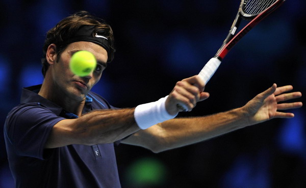 Federer warms up for semis with defeat of Fish