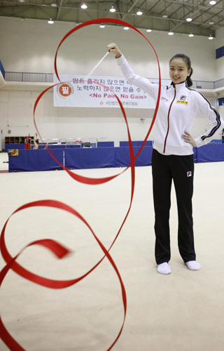 No pain, no gain for South Korean gymnast