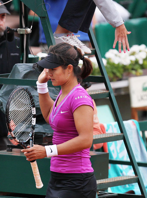 Defending Li Na knocked out by qualifier