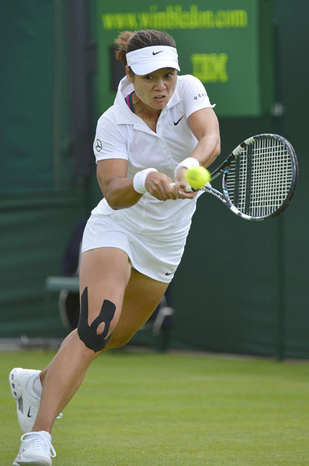 Li Na eases into second round in Wimbledon