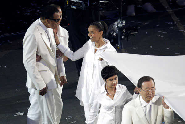 Seven teenagers light Olympic cauldron