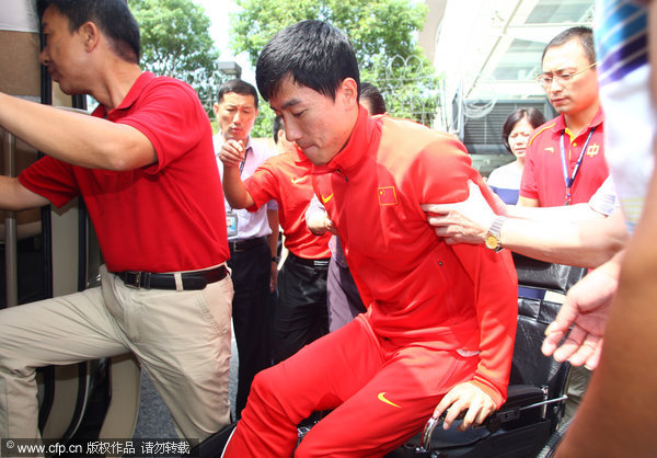 Liu Xiang returns to China after surgery