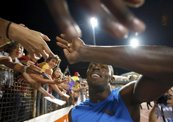 Bolt wins 200, Blake sets personal best