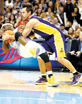 Chandler leads Nuggets past Lakers, 119-108