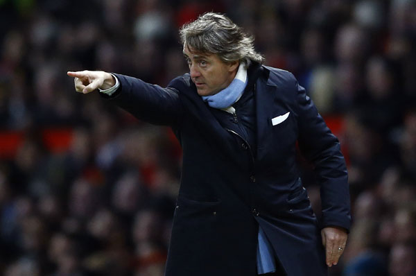 Man City fires manager Roberto Mancini