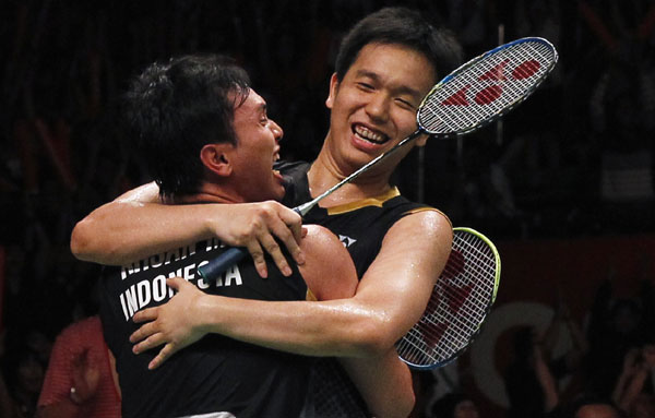 Indonesian men's doubles badminton players win gold medal at home
