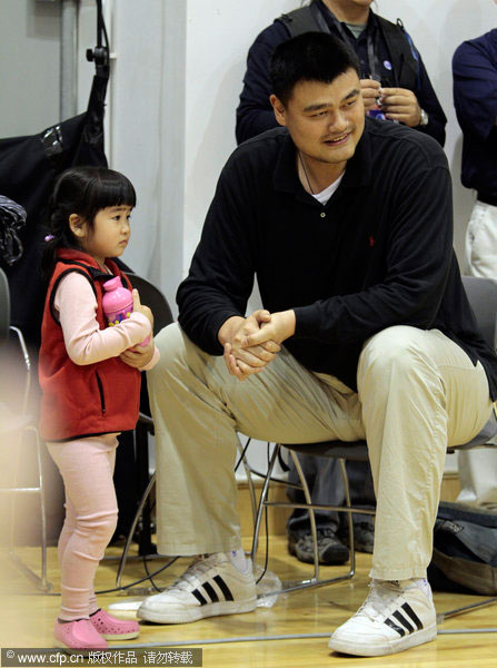 Yao with his daughter at the NBA Cares[1]