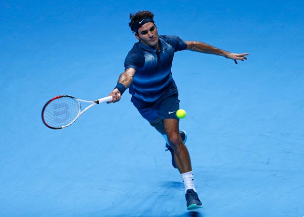Federer back on track with victory over Gasquet