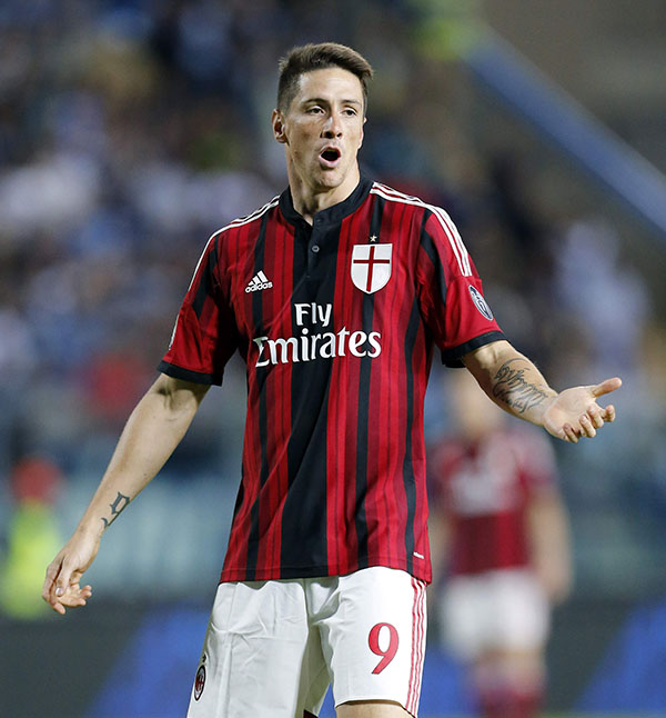 torres scores on first start for ac milan