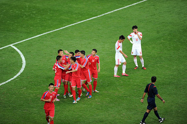 For China, soccer is passion and misery