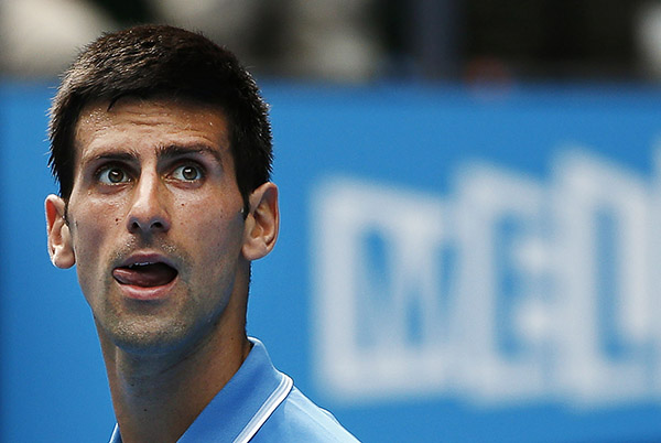 Djokovic, Wawrinka advance to 2nd round at Australian Open