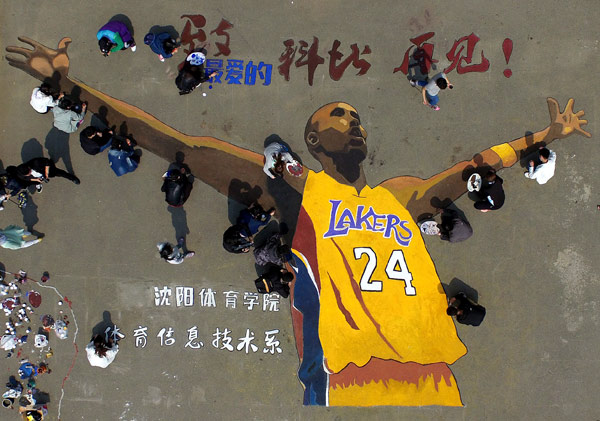 Fans hail a legend as Kobe quits