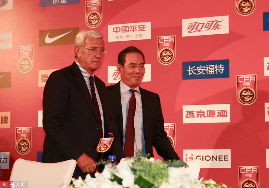 Marcello Lippi attends the CFA Team China press conference in Beijing