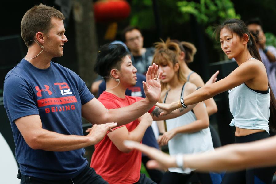 NFL star Tom Brady 'dreams' of playing football game in China