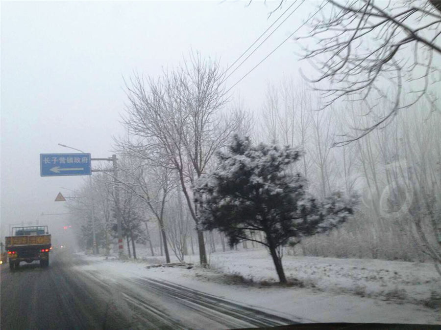 Beijing enjoys first snow